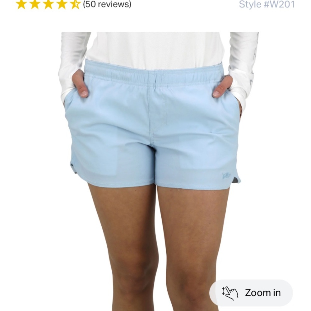 Women’s light blue Aftco fishing shorts.